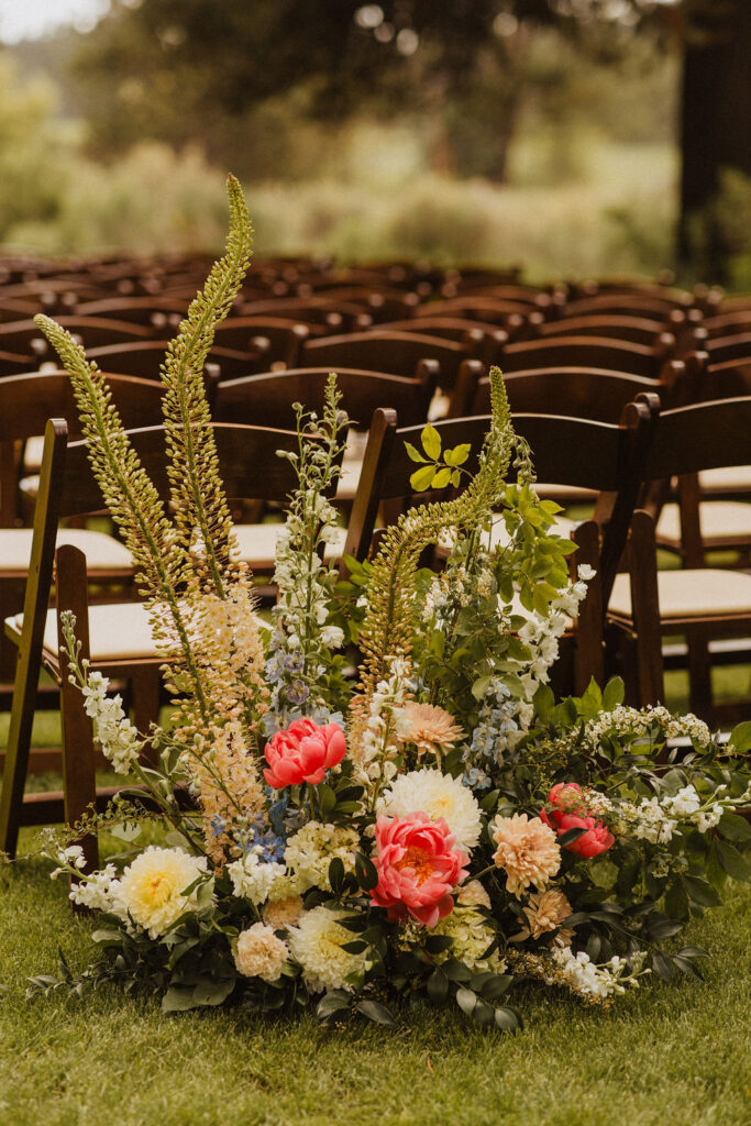 Large bright ceremony Aisle flowers 